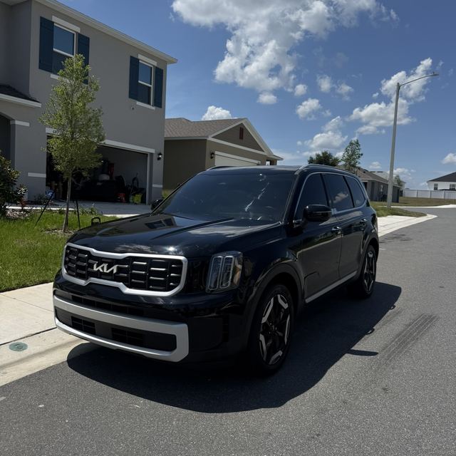 Ceramic window tint on a black Kia Telluride SUV — Kissimmee, FL