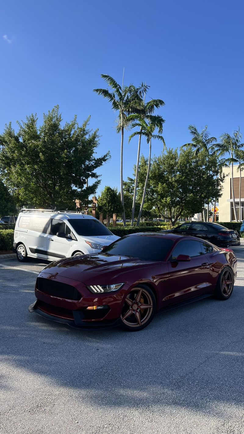 Ceramic window tint on a maroon Ford Mustang — JJ Shiny Tints mobile job in Central Florida