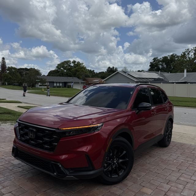 Ceramic window tint on a red Honda SUV — mobile window tint in Central Florida