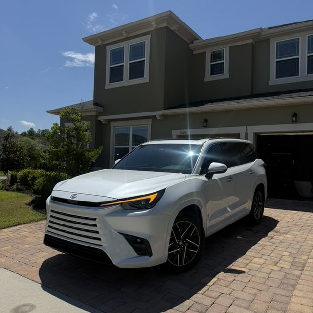 Ceramic window tint on a white Lexus SUV — Kissimmee, FL
