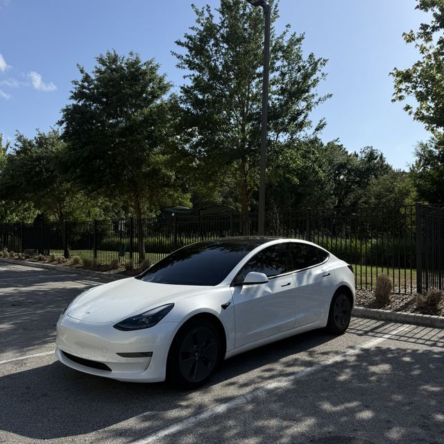 Ceramic window tint on a white Tesla Model 3 — Kissimmee, FL