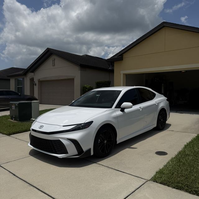 Ceramic window tint on a white Toyota Camry sedan — Kissimmee, FL